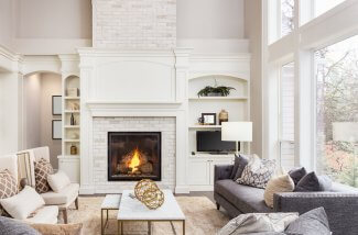 a white livingroom with picture windows