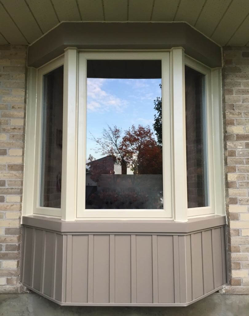 bay window fixed casement flashing siding beige tan brown