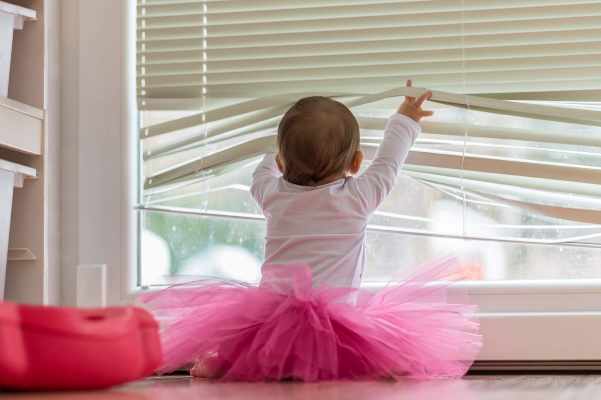 Cute little baby girl wearing a pink tutu