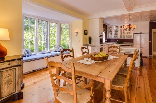 dining room with bay windows