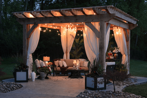 well decorated and lit patio at night time