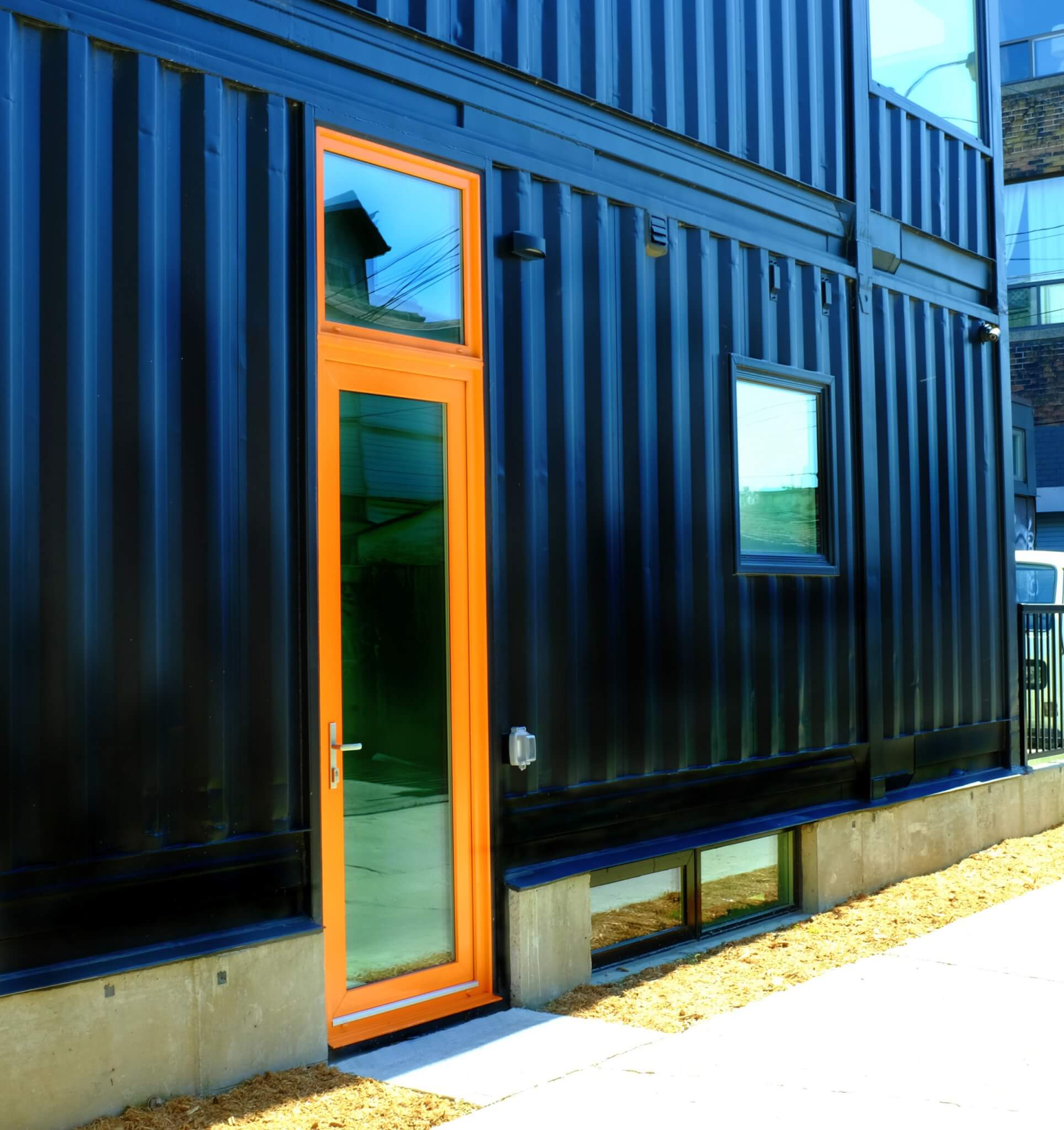 Container Home Orange Entry Door