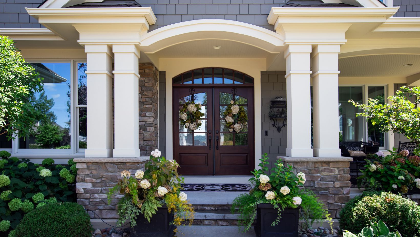 Entry door with custom glass and a transom